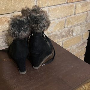 Black fur trimmed wedge boots